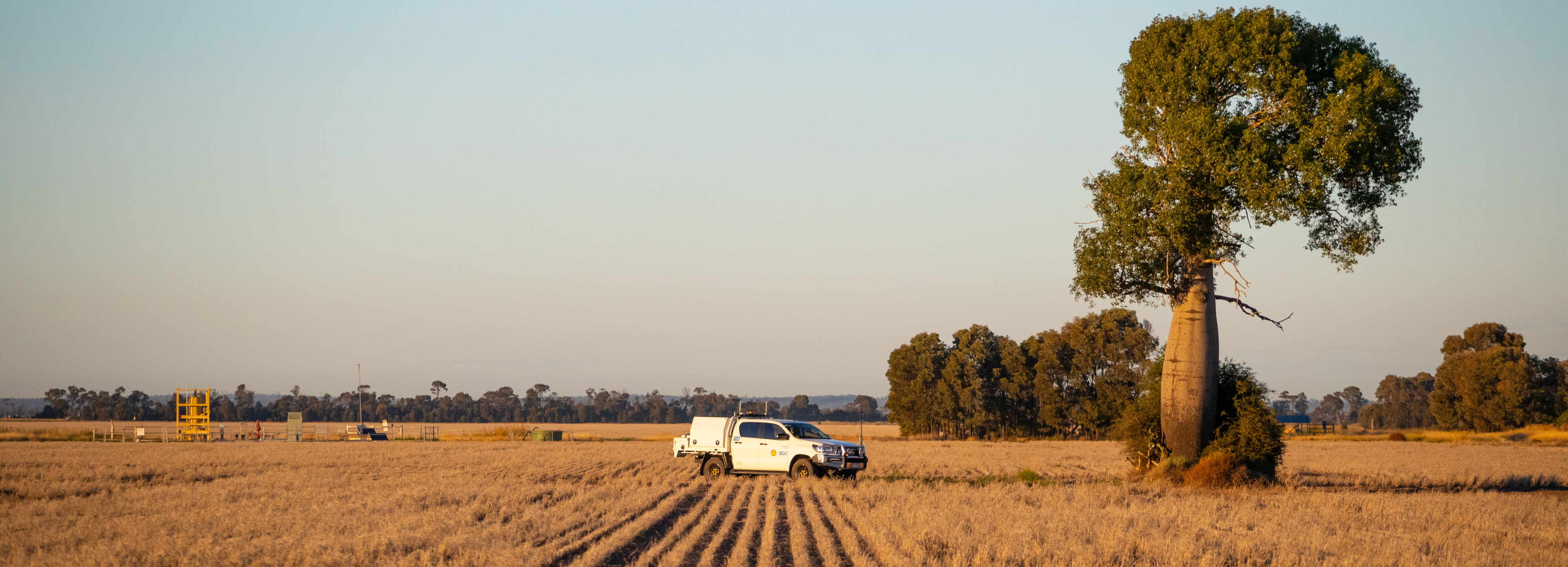 Wellsite on landholer property with vehicle and boab tree_cropped